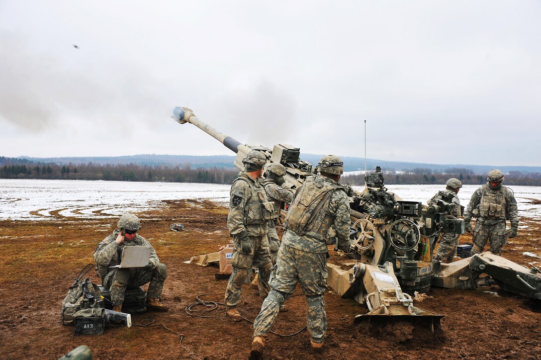 U.S. Army field artillery soldiers conclude a mass mire mission with M777 howitzers during their participation in Operation Chosin on the 7th Army Joint Multinational Training Command’s Grafenwoehr Training Area in Germany, Jan. 28, 2015. 