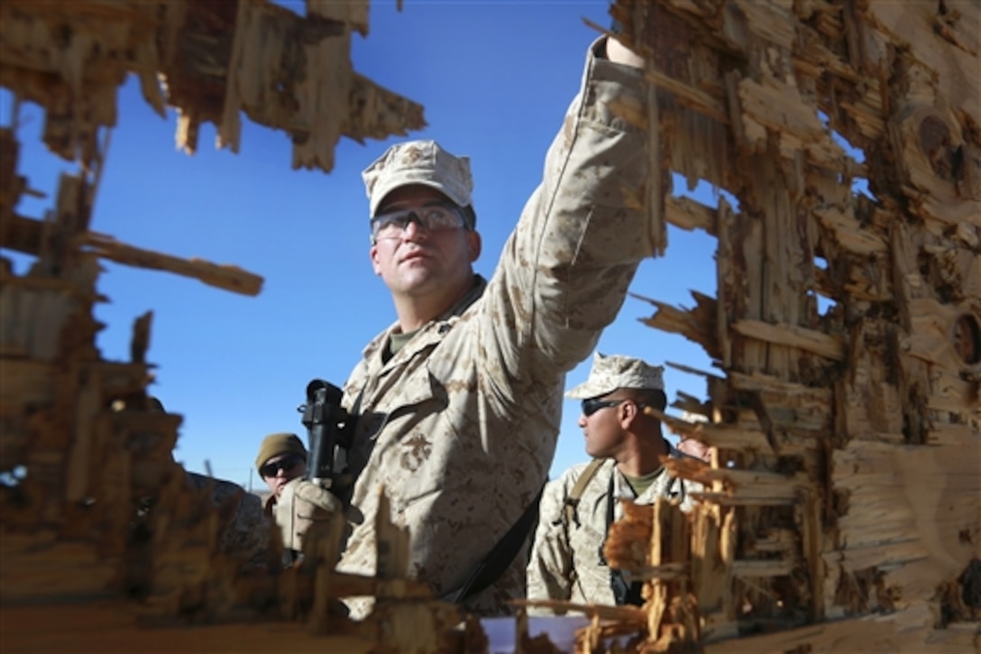 Marines view their targets after shooting during a training exercise on Camp Wilson at Twentynine Palms, Calif., Jan. 21, 2015. The Marines are assigned to Combat Logistics Detachment 1, Combat Logistics Battalion 13, 1st Marine Logistics Group.