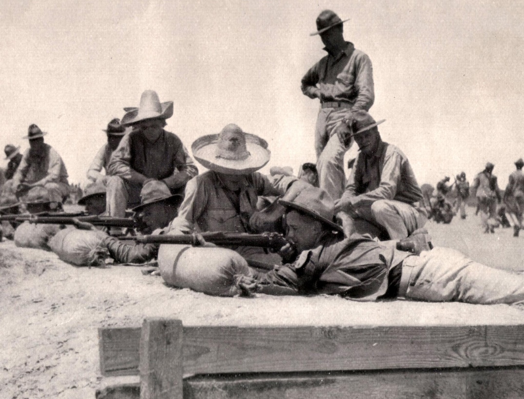 Rifle range coaches wear sombreros.
Photo circa 1918