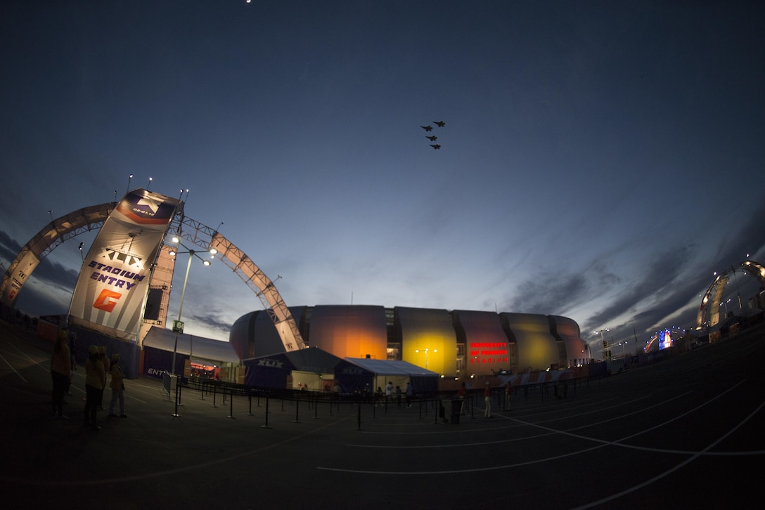 Four F-35 Lightning IIs perform the first-ever F-35 aircraft flyover, opening the 2015 NFL Pro Bowl game Jan. 25, 2015, at the University of Phoenix Stadium in Glendale, Ariz. The F-35s assigned to the 61st Fighter Squadron at Luke Air Force Base, Ariz. (U.S. Air Force photo/Staff. Sgt. Nestor Cruz )