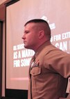 Capt. Joseph Haley, operations officer, RS Indianapolis, gives a leadership presentation at 2015 Glazier Coaches Clinics in Indianapolis Jan. 24. 