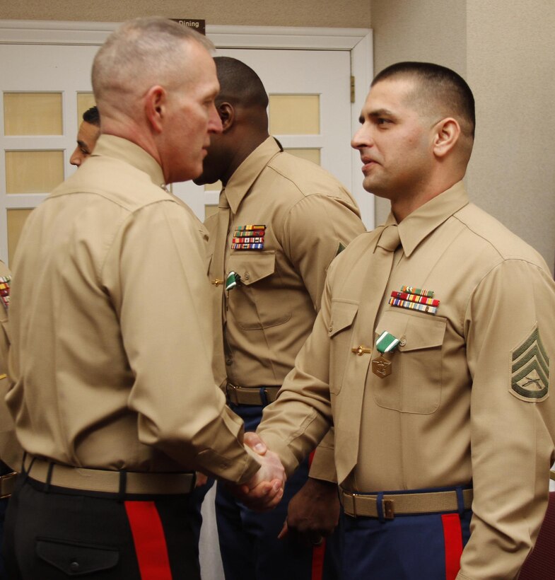 Gunnery Sgt. Orlando Torres, prior service recruiter, Recruiting Station Milwaukee, was awarded the Navy Acommendation Medal for being named the Prior Service Recruiter of the Year for FY14 on Jan. 29 at the Clubs at Quantico during the Combined Awards Ceremony. Gunnery Sgt. Torres was also meritoriously promoted from the rank of staff sergeant to gunnery sergeant that day.