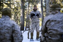 U.S. Navy Lt. Todd Mallory, the Chaplain with Combat Logistics Battalion 26, Headquarters Regiment, 2nd Marine Logistics Group, leads a sermon for the Marines, sailors and soldiers during a break in training at U.S. Marine Corps Mountain Warfare Training Center aboard Bridgeport, California, Jan. 24, 2015. Mallory gave service members an opportunity to pray for their peers as they faced challenges on the mountain, as well as for their family members back home. (U.S. Marine Corps photo by Lance Cpl. Kaitlyn Klein/Released)