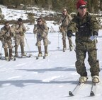 Cpl. Jarrod Bolden, a Mountain Warfare Instructor Training Center Instructor with the U.S. Marine Corps Mountain Warfare Training Center, teaches the Marines different skiing techniques for their use on the mountain at Bridgeport, California, Jan. 20, 2015. The Marines learned how to gain momentum on the skis without falling, as well as climbing and practicing break-falls. (U.S. Marine Corps photo by Lance Cpl. Kaitlyn Klein/Released)