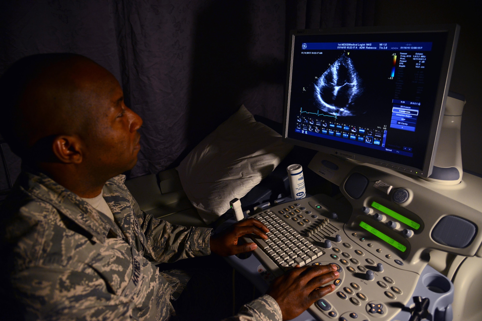 Staff Sgt. Arjune Haynes reviews an echocardiogram Jan. 16, 2015, at Langley Air Force Base, Va. Haynes, originally from Trujillo, Panama, was inspired to join a branch of the U.S. armed forces after a life-changing encounter with a service member during Operation Just Cause in 1989. Haynes is the 633rd Medical Operations Squadron cardiopulmonary services assistant NCO in charge. This photo has been altered to protect patient information. (U.S. Air Force photo/Senior Airman Aubrey White)