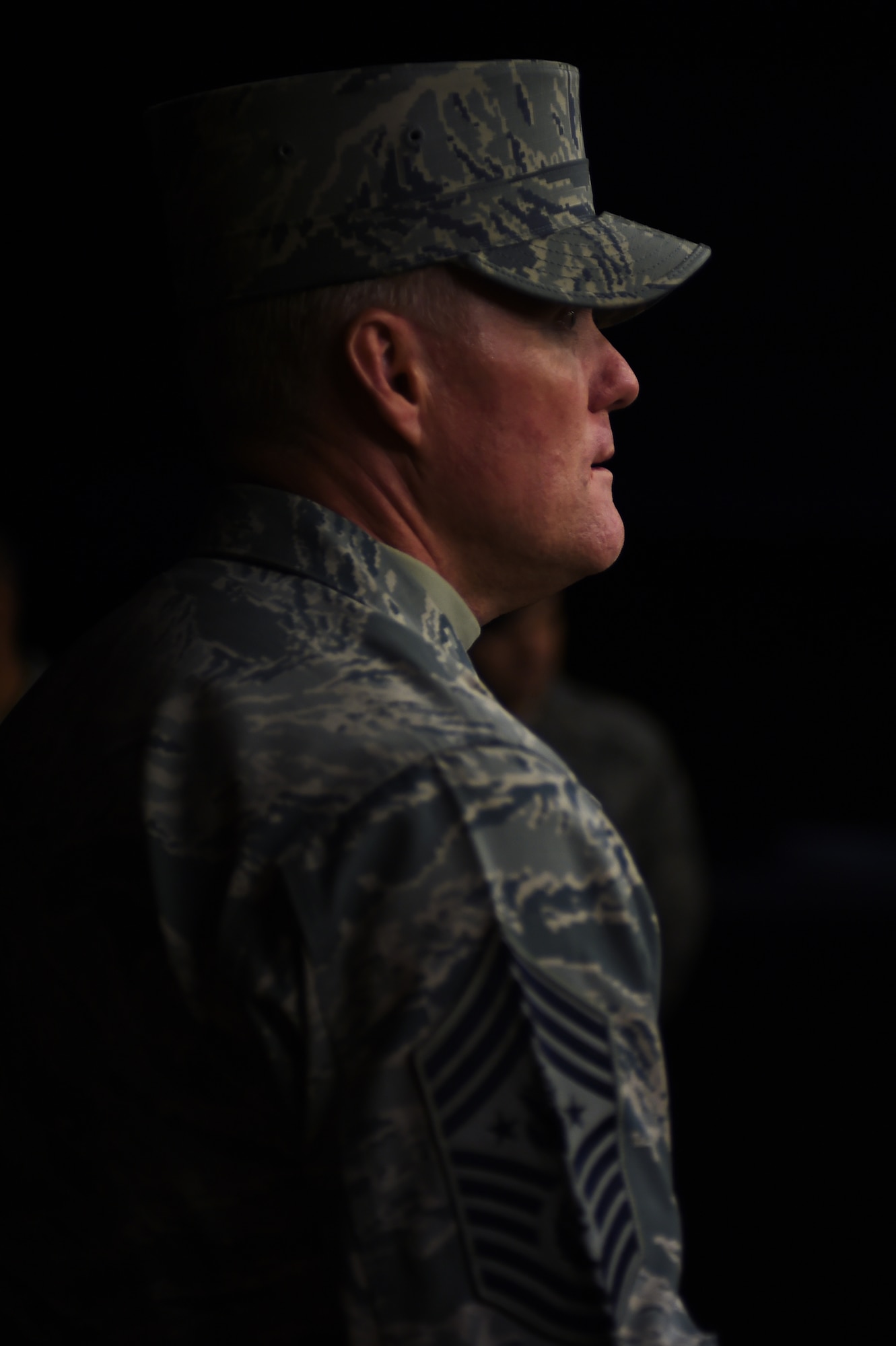 Chief Master Sgt. of the Air Force James A. Cody speaks with 423rd Security Forces Airmen Jan. 27, 2015, during a visit to Royal Air Force Alconbury, England. During the visit, Cody was given a firsthand look into the innovative spirit that embodies the 501st Combat Support Wing through the accomplishments of its Airmen. (U.S. Air Force photo/Staff Sgt. Jarad A. Denton)