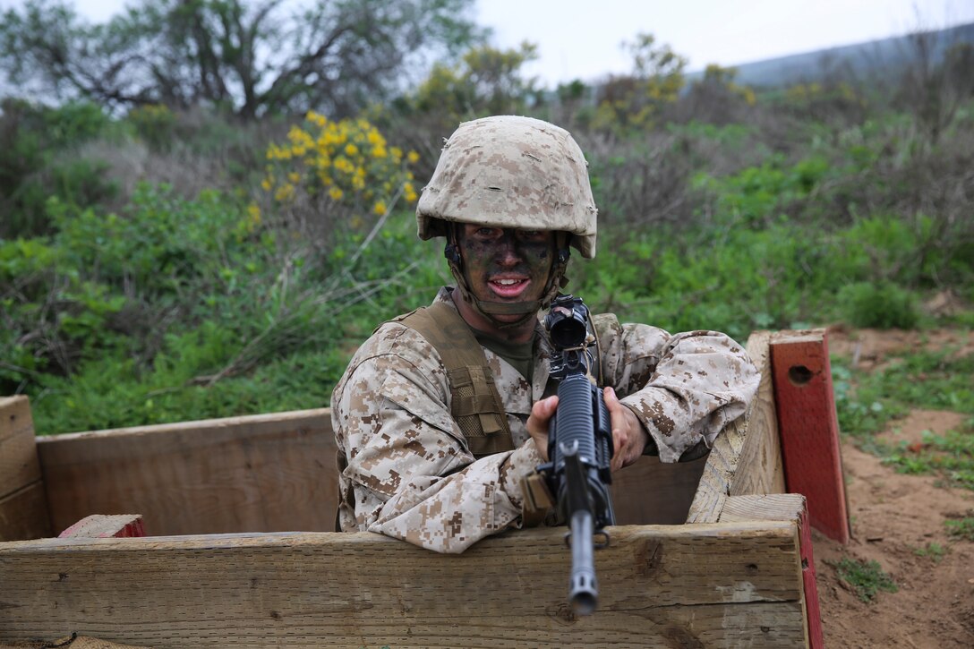 Lance Cpl. James M. Cates, Platoon 3245, Lima Company, 3rd Recruit Training Battalion, mans a fighting hole during the Basilone’s Challenge event at Edson Range, Marine Corps Base Camp Pendleton, Calif., Jan. 20. Following graduation, Cates will take on the School of Infantry in Camp Pendleton, Calif., to pursue a career as an infantryman and plans on learning as much as he can from the Marine Corps while he is enlisted. Cates is a native of Prior Lake, Minn., and was recruited out of Recruit Station Twin Cities.