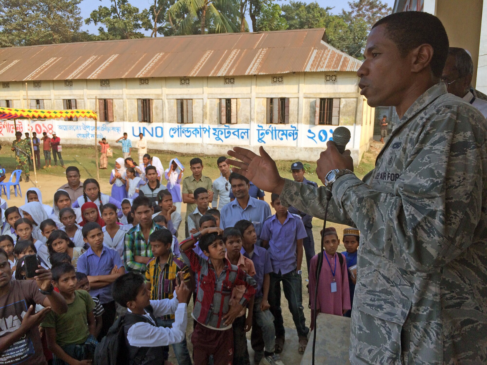 U.S. Air Force 1st Lt. Willie Larkins addresses students and faculty at Goainghat Primary School in Sylhet, Bangladesh during Exercise COPE SOUTH, Jan. 28, 2015. Larkins is an aircraft maintenance officer assigned to the 374th Aircraft Maintenance Squadron, Yokota Air Base, Japan. COPE SOUTH helps cultivate common bonds, foster goodwill, and improve readiness and compatibility between members of the Bangladesh and U.S. Air Forces. (U.S. Air Force photo by Senior Airman Ashley Powell/Released)