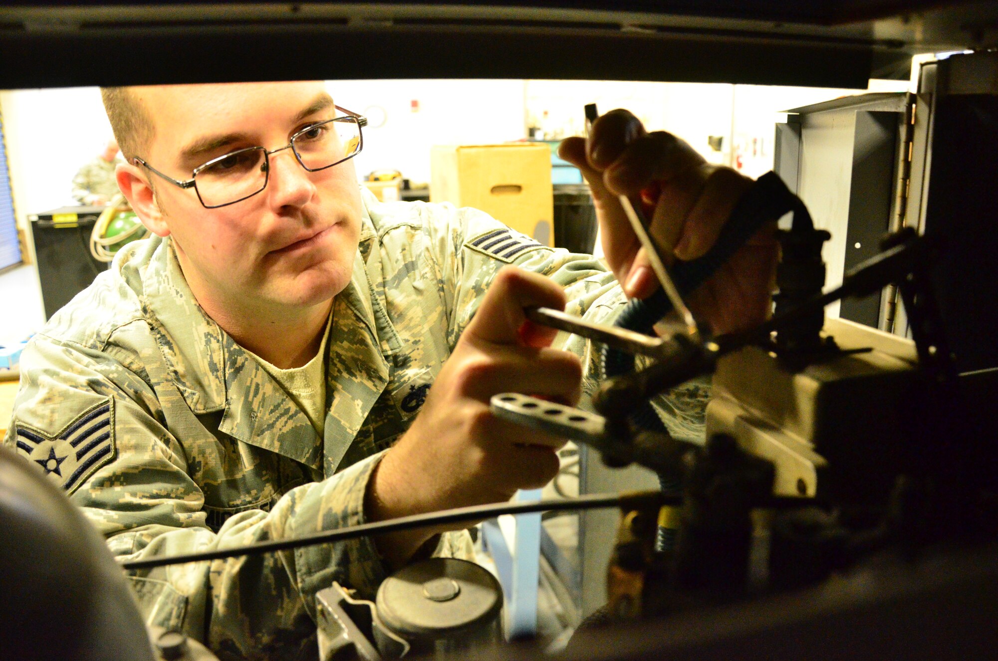 Staff Sgt. Daniel Michael, Aerospace Ground Equipment craftsman assigned to the 403rd Maintenance Squadron adjusts governor actuator on a generator 30 Jan. 2015 in the Roberts Consolidated Maintenance Facility at Keesler Air Force Base, Biloxi, Miss. The AGE shop is responsible for the maintenace and repair of all ground equipment assigned to the 403rd Wing.
