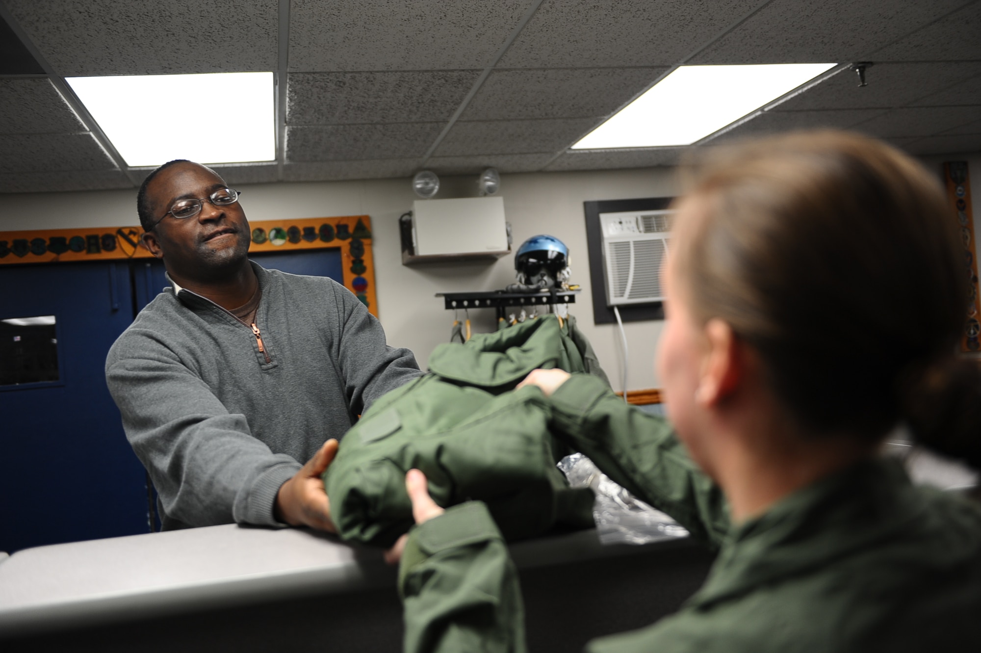 Willie Crawford, 14th Logistics Readiness Squadron Material Specialist, issues an upcoming student pilot flight equipment Jan. 27 on Columbus Air Force Base, Miss. 14th LRS Material Management Flight also handles the equipment that is needed for Airmen who are deploying. (U.S. Air Force photo/Airman Daniel Lile)