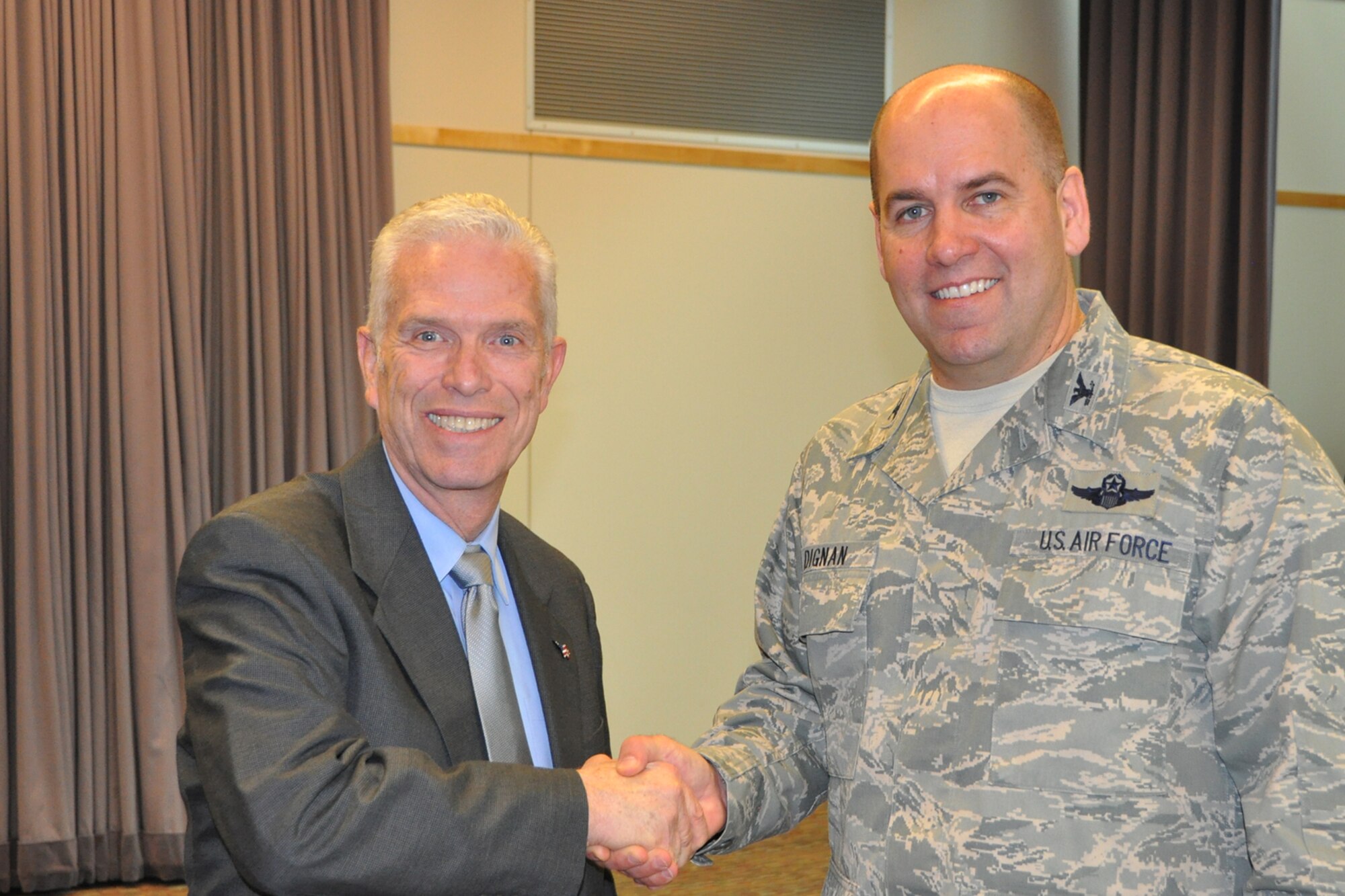 COLUMBUS, Ohio – U.S. Congressman Bill Johnson, representative of Ohio’s 6th district, and Air Force Reserve Col. James Dignan (far left), commander of the 910th Airlift Wing based at Northeast Ohio’s Youngstown Air Reserve Station, stand for a photo after a meeting in the Nationwide & Ohio Farm Bureau 4-H Center Bob Evans Memorial Auditorium here, Jan. 23, 2015. Dignan and other leaders from Ohio’s Department of Defense (DoD) facilities and organizations were invited to brief a congressional panel of members of Ohio’s delegation to the U.S. House of Representatives and to participate in a discussion intended to give the delegation a better understanding of the status, missions and importance of the various DoD assets located across the state. U.S. Air Force photo by Master Sgt. Bob Barko Jr.