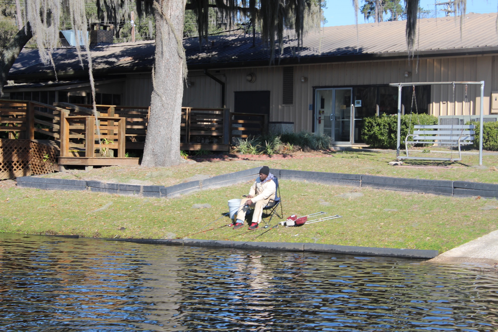 A visitor fishes Jan. 27, 2015, at Grassy Pond in Lake Park, Ga. Other amenities available for attendees include the three-mile nature trail, pedal boats and tent camp sites. (Courtesy photo)