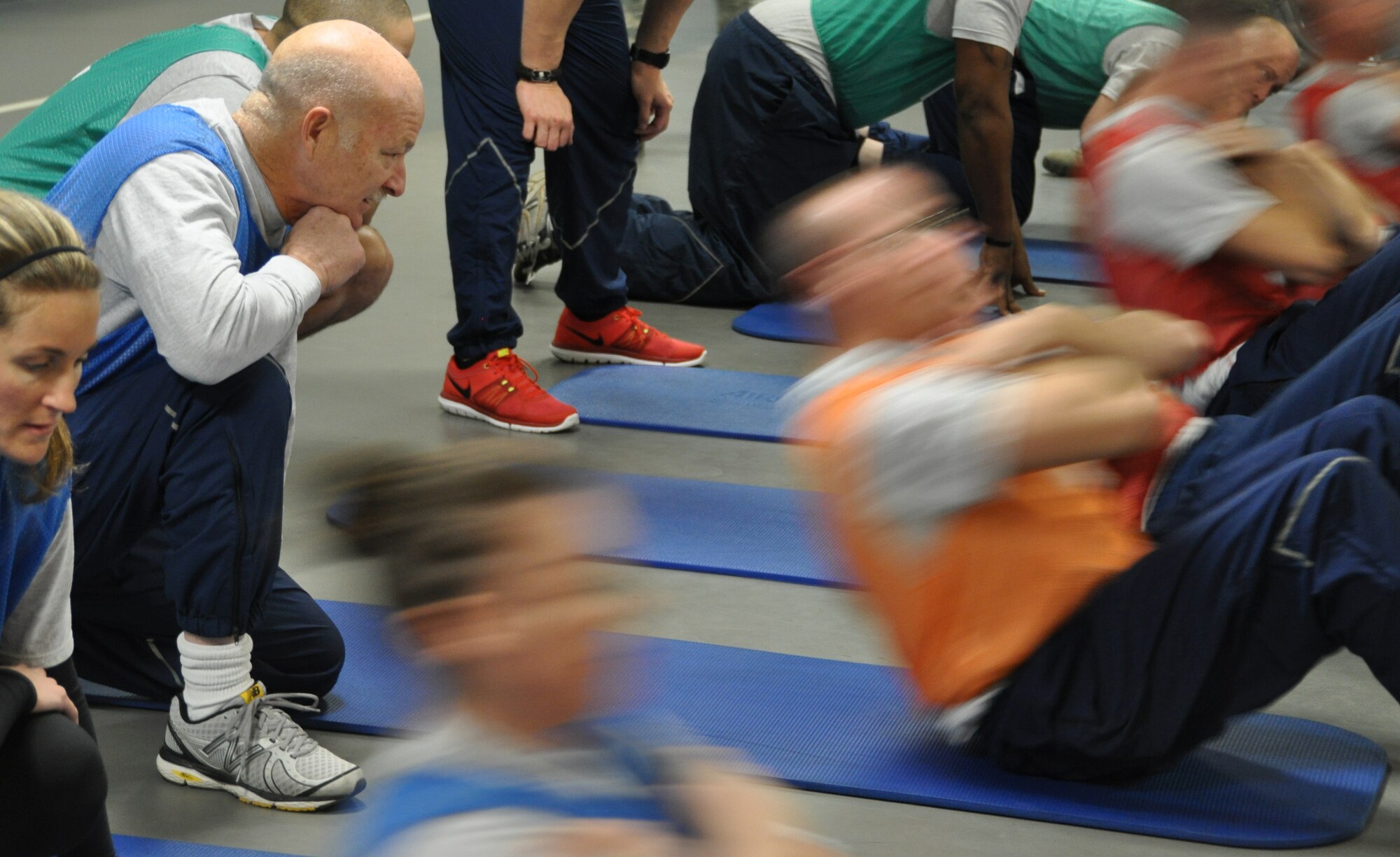 Chief Master Sgt. Ken Koyles (in blue jersey), superintendent of the 476th Fighter Group out of Moody AFB, Georgia- a geographically separated unit from the 442d Fighter Wing out of Whiteman AFB, Missouri- completes his final graded fitness test the morning of January 11 near Valdosta, Georgia. Koyles plans to continue participating in the fitness test, which he completes every month to assist the Airmen of the 476th Fighter Group. Koyles first retired from the Air Force in 1997. (Air Force photo by the 442d Fighter Wing)