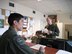 U.S. Air Force Capt. Trevor Sutherland, a C-130 pilot for the Kentucky Air Guard's 165th Airlift Squadron, interacts with Polish Air Force officials at Powidz Air Base, Poland, Dec. 10, 2014, during a three-week deployment in support of Operation Atlantic Resolve. The Kentucky Air Guard fielded two C-130 aircraft and 50 personnel to conduct joint training and focus on interoperability in support of NATO operations. (Courtesy Photo)