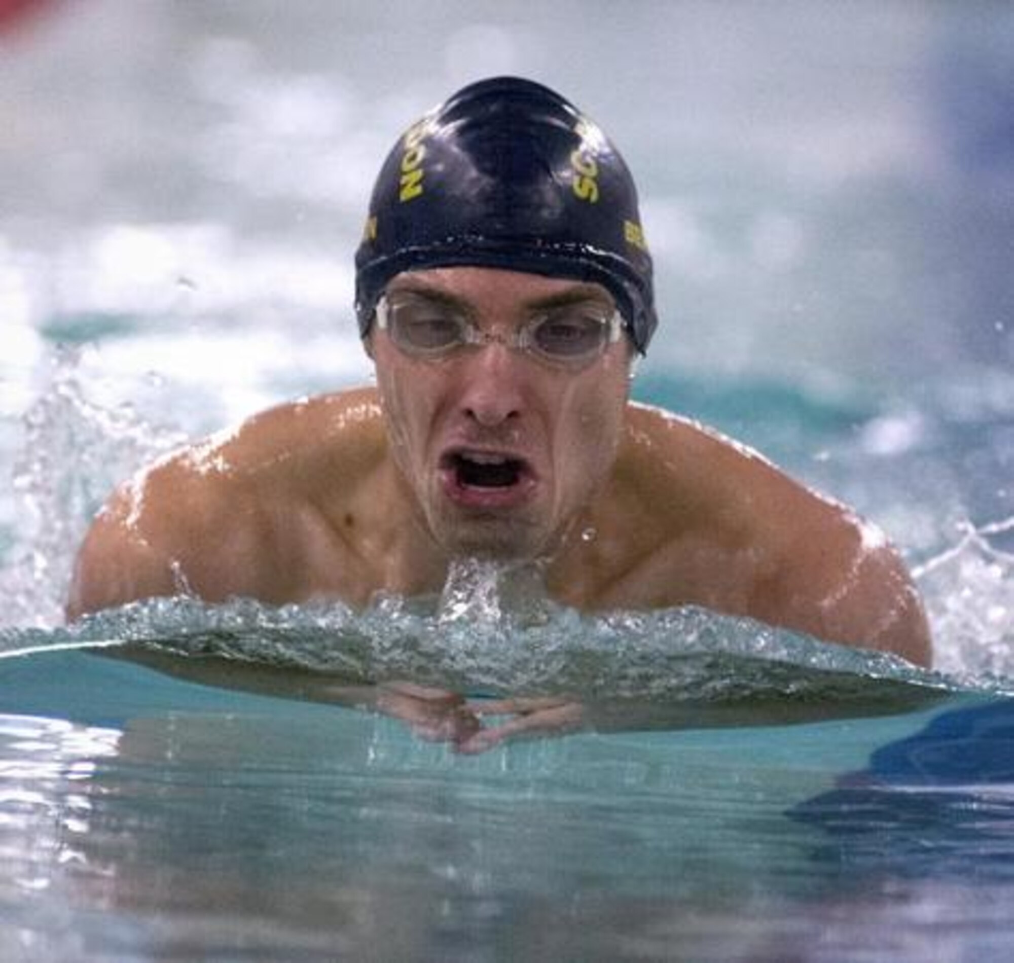 7th AS team member Neil Senkowski swims to victory in the men's 200-meter Jan. 21 during the JBLM Swimming Championships at Soldiers Field House. (Northwest Guardian/courtesy photo)
