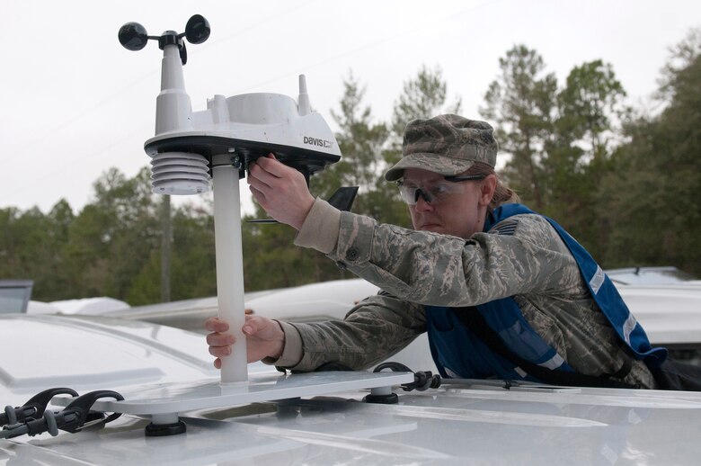 Air Force Master Sgt. Jessica Nelson, bio-environmental engineering technician with the Kentucky National Guard CERFP, sets up an electronic weather station during Operation Starke Thunder at Camp Blanding in Starke, Fla., Jan. 12, 2015. The four-day exercise certified the joint Kentucky Army and Air Guard emergency-response team as mission-ready. (U.S. Air National Guard photo by Staff Sgt. Vicky Spesard)