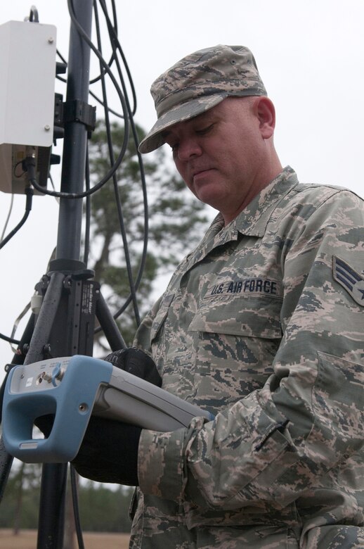 Air Force Senior Airman Eric Clark from the Kentucky National Guard CERFP uses Joint Incident Site Communications Capability to provide wireless communications during Operation Starke Thunder at Camp Blanding in Starke, Fla., Jan. 13, 2015. The four-day exercise certified the joint Kentucky Army and Air Guard emergency-response team as mission-ready. (U.S. Air National Guard photo by Staff Sgt. Vicky Spesard)