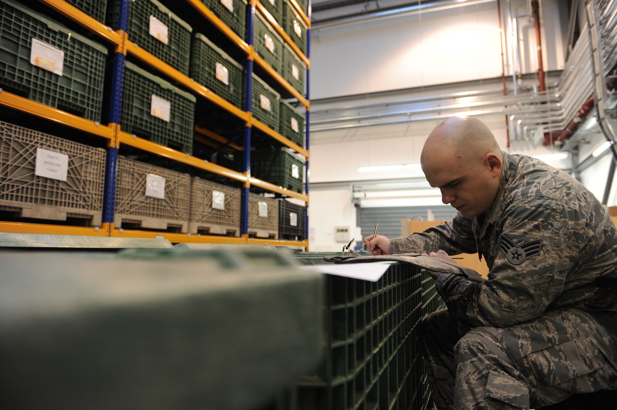 Senior Airman Zachary Kettner, 86th Logistics Readiness Squadron individual protective equipment journeyman, tracks the number of Kevlar vests in a container on Ramstein Air Base, Germany, Jan. 28, 2015. The IPE team services all of U.S. Air Forces in Europe and Air Forces Africa with protective equipment to include chemical, biological, radiological, nuclear and explosives gear, Kevlar helmets, individual body armors and weapons. (U.S. Air Force Photo/Airman 1st Class Michael Stuart) 
