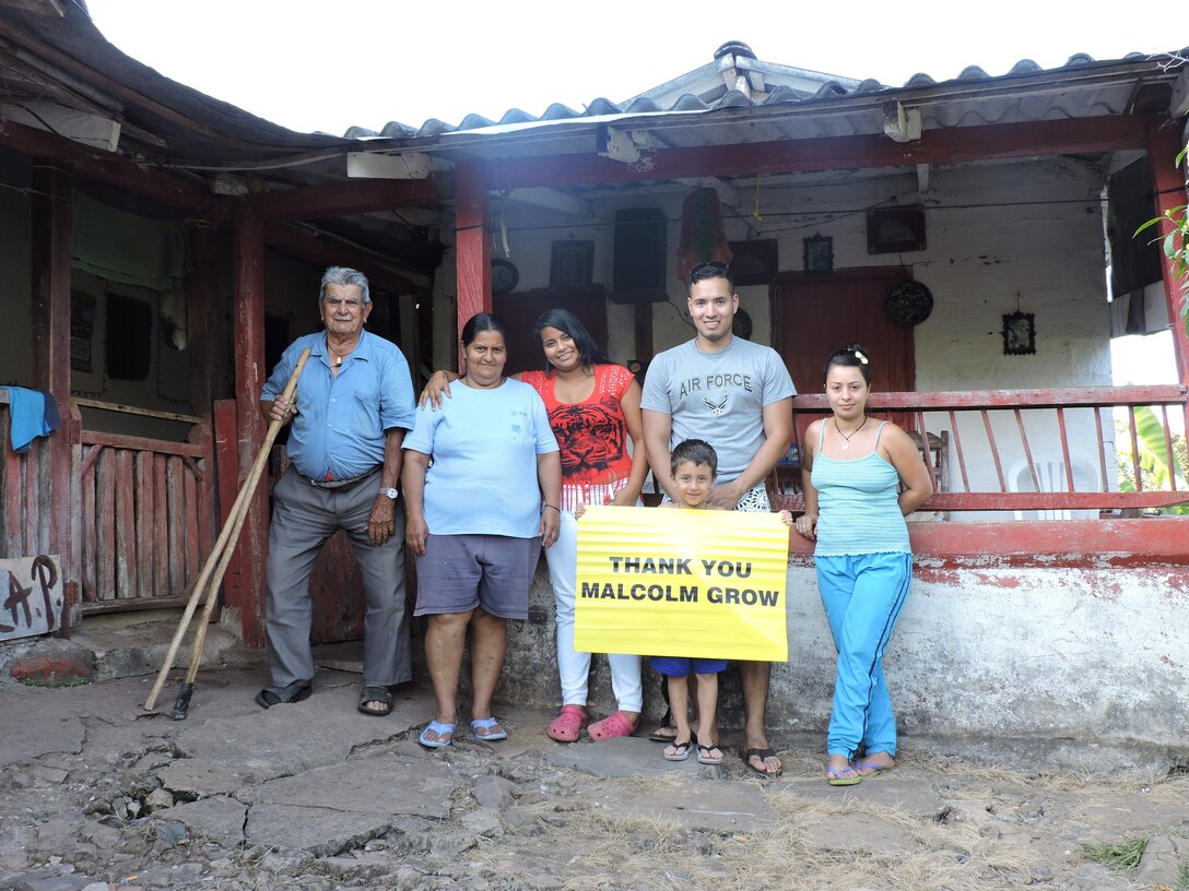 Airman First Class Alejandro Munera is a Diagnostic Imaging Technician stationed at the 779th Medical Group on Joint Base Andrews.  This Christmas he wanted to make a real difference. When he decided to visit his family in Colombia for the holidays, he was inspired to put together a clothing donation drive to help those in need. Malcolm Grow Medical Clinics and Surgery Center (MGMCSC) donated 310 lbs. of clothing, shoes, and toys. “You can't imagine the gratitude; love and respect the people of Valparaiso, Columbia now have for The United States Air Force and the medics of MGMCSC. Nine hard working people live in this humble house. The 95 year old man in this picture could not hold back his tears of gratitude. This was the first time in a long time he could wear something “new” on the holidays. This family gave me a typical holiday dessert in return," said Munera. 