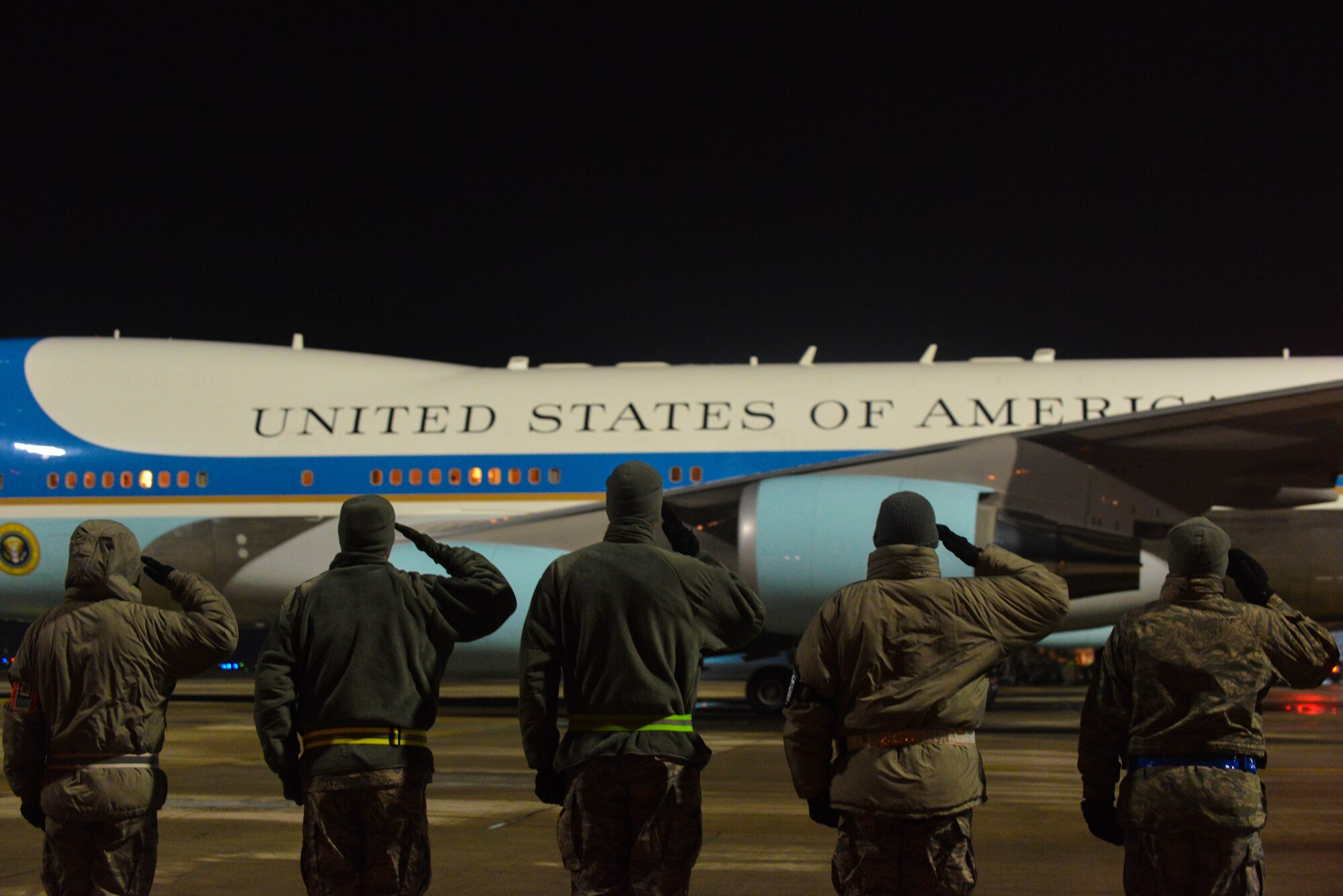 U.S. Air Force leaders salute as Air Force One departs after a refueling on Ramstein Air Base, Germany, Jan. 27, 2015.  The President of the United States made a brief stop at Ramstein for refueling before heading back to the states. (U.S. Air Force photo/Senior Airman Nicole Sikorski)