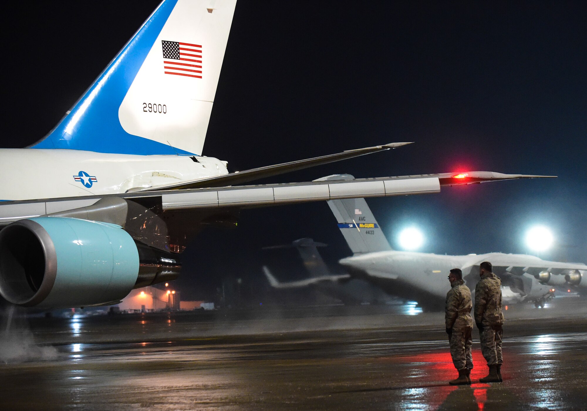 Brig. Gen. Patrick X. Mordente (left), 86th Airlift Wing commander, and Gen. Frank Gorenc, U.S. Air Forces in Europe and Air Forces Africa commander, watch as Air Force One departs Ramstein Air Base, Germany, Jan. 27, 2015. The President of the United States made a brief stop at Ramstein for refueling before heading back to the states. (U.S. Air Force photo/Senior Airman Nicole Sikorski)