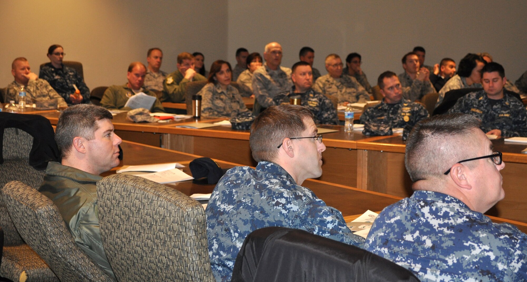 About 75 individuals representing Air Force and Navy leadership attended a Sexual Assault Prevention and Response Symposium Jan. 21 to get reacquainted with policies regarding sexual assault. The group was briefed by base agencies such as the Sexual Assault Victim Advocates, Equal Opportunity, Family Advocacy, Domestic Abuse Victim Advocate, Civilian Personnel, Office of Special Investigations, the Judge Advocate and Special Victims Council, Mental Health and the Chaplain Corps. The leaders were given scenarios and had to come up with the correct plan of action and learned that no matter the scenario, leaders should always call OSI for unrestricted reports of sexual assault. Victims requesting a restricted report should contact the Sexual Assault Response Coordinator first. The symposium provided a place to voice questions and concerns and to receive answers directly from the helping agencies. Col. Lea Kirkwood, 72nd Air Base Wing vice commander, said the base is making strides and improvements to the process and urged everyone to reach out for assistance when dealing with SAPR issues. (Air Force photo by Kimberly Woodruff)

