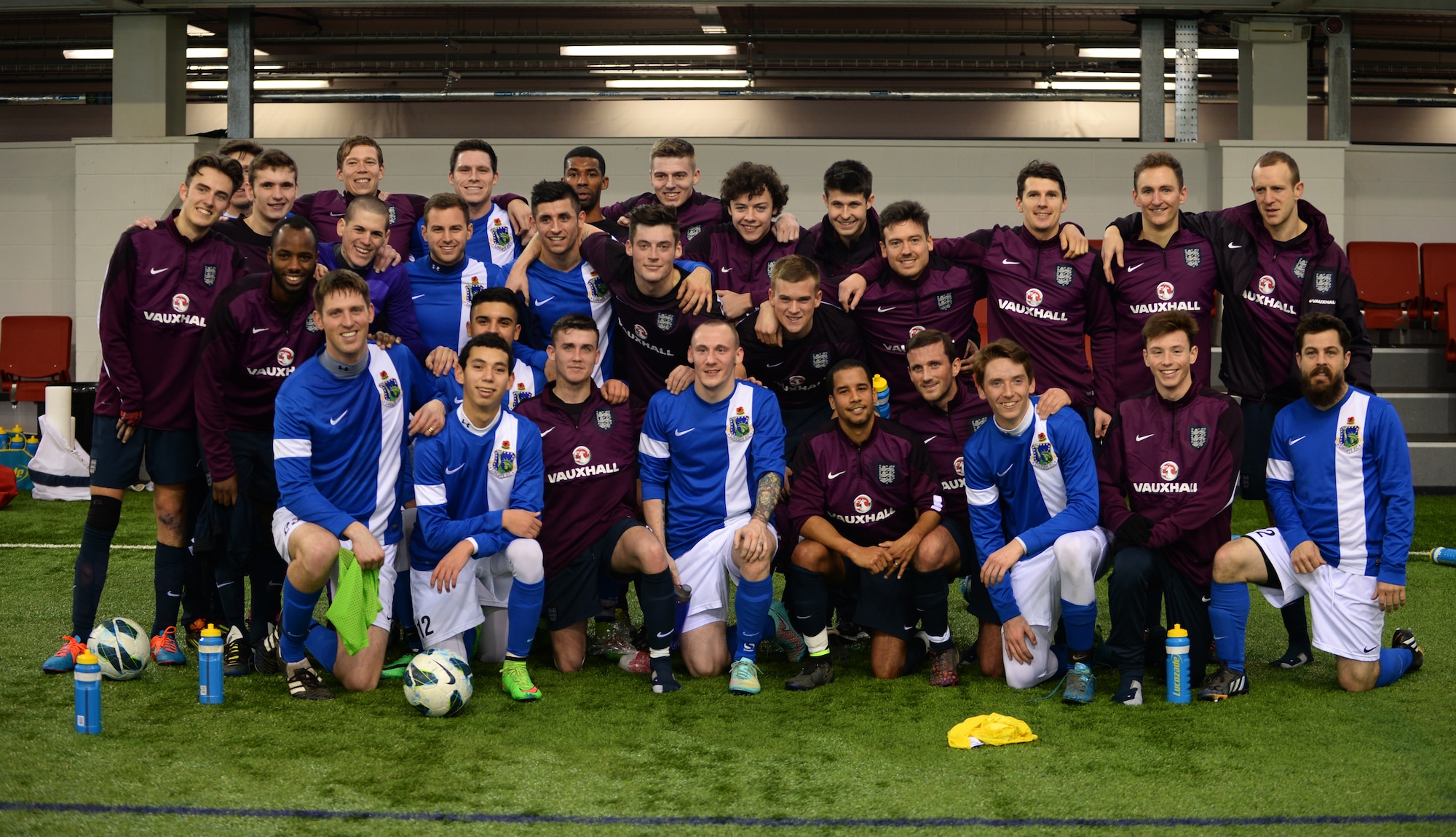 Members of the Liberty Football Club and the world-ranked England Cerebral Palsy team pose for a group photo after a match at St. George’s Park, England, Jan. 25, 2015. The England CP team ended their four-day training camp with a friendly match against the American team. (U.S. Air Force photo by Staff Sgt. Emerson Nuñez/Released)