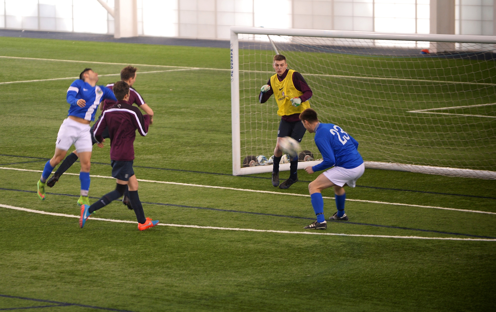 Maj. Doug Grabowski, a forward for the Liberty Football Club, attempts to score during a match against the world-ranked England Cerebral Palsy team at St. George’s Park, England, Jan. 25, 2015. Active duty members, dependents and high school students are welcome to join the Liberty Football Club. (U.S. Air Force photo by Staff Sgt. Emerson Nuñez/Released)