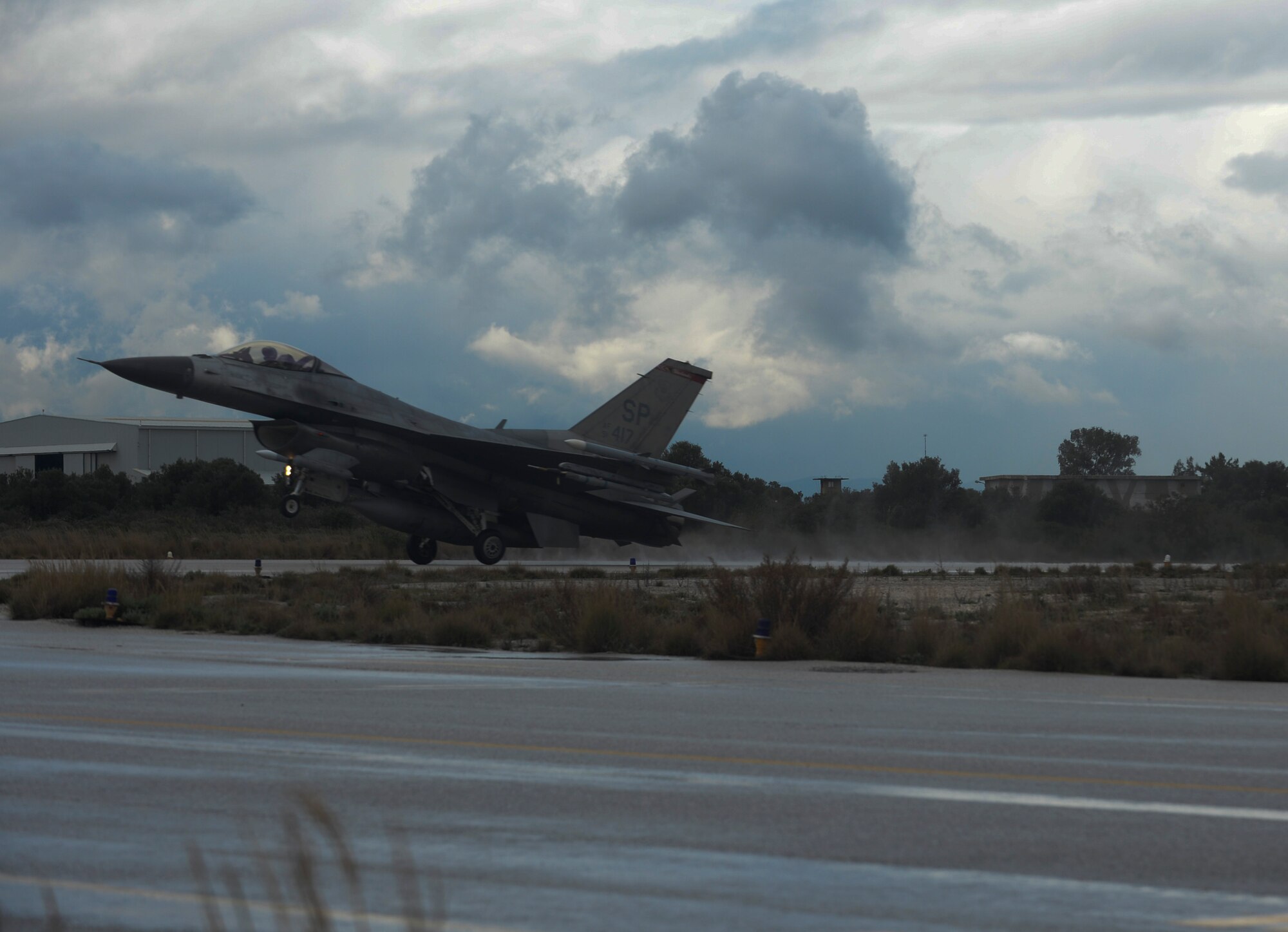 A U.S. Air Force F-16 Fighting Falcon fighter aircraft assigned to the 480th Expeditionary Fighter Squadron lands on the flightline during a flying training deployment at Souda Bay, Greece, Jan. 29, 2015. The aircraft conducted the training as part of the bilateral deployment between the Greek and U.S. Air Forces to develop interoperability and cohesion between the two NATO partners. (U.S. Air Force photo by Staff Sgt. Joe W. McFadden/Released)
