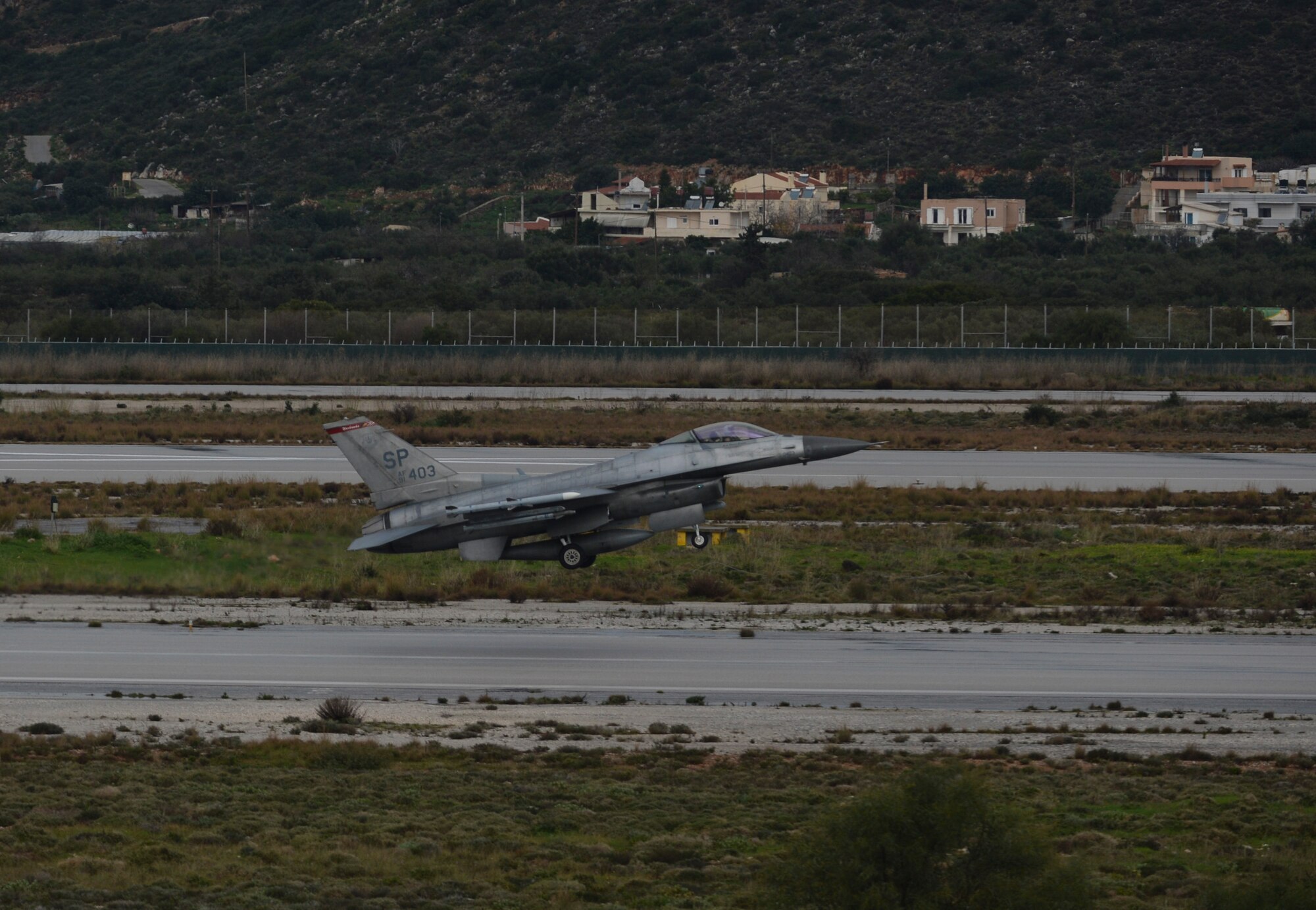 A U.S. Air Force F-16 Fighting Falcon fighter aircraft assigned to the 480th Expeditionary Fighter Squadron takes off during a flying training deployment on the flightline at Souda Bay, Greece, Jan. 29, 2015. The aircraft conducted the training as part of the bilateral deployment between the Greek and U.S. Air Forces to develop interoperability and cohesion between the two NATO partners. (U.S. Air Force photo by Staff Sgt. Joe W. McFadden/Released)