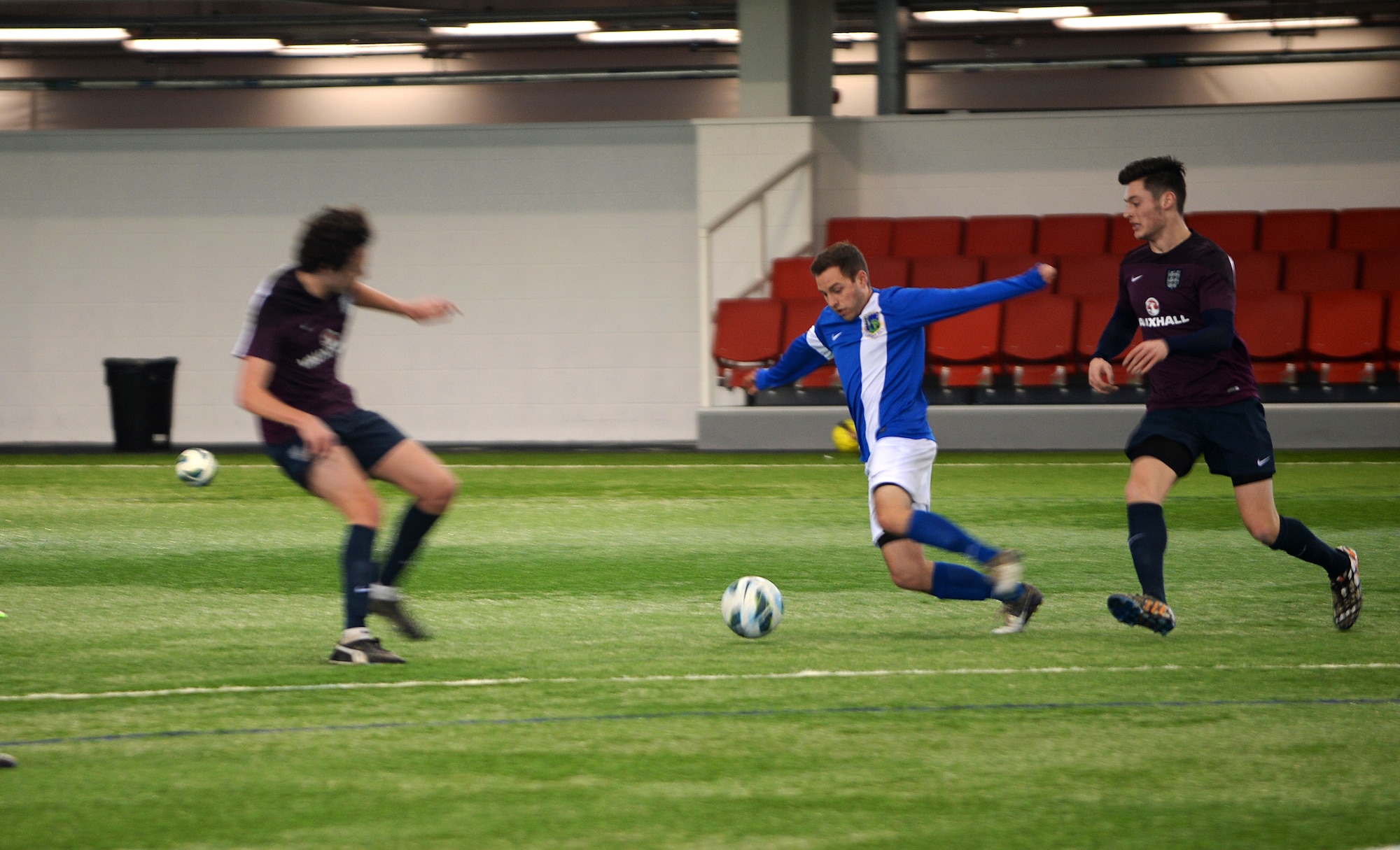 Airman 1st Class Justin Howard, a defender for the Liberty Football Club, prepares to pass the ball to a teammate during a match against the world-ranked England Cerebral Palsy team at St. George’s Park, England, Jan. 25, 2015. This match highlighted the continued cooperation and relationship between the U.K. and the U.S. (U.S. Air Force photo by Staff Sgt. Emerson Nuñez/Released)