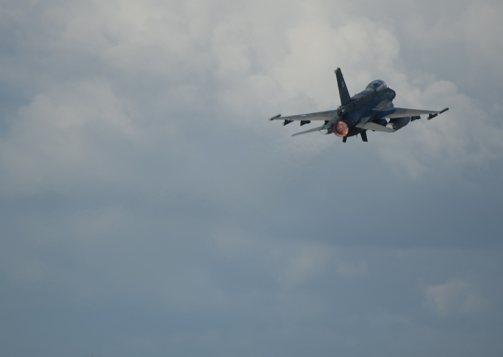 A Hellenic air force F-16 Fighting Falcon fighter aircraft assigned to the 340th Fighter Squadron takes off from the flightline during a flying training deployment at Souda Bay, Greece, Jan. 28, 2015. The training covered basic and air combat maneuvers aimed at honing the skills between the Greek and U.S. Air Forces. (U.S. Air Force photo by Staff Sgt. Joe W. McFadden/Released)