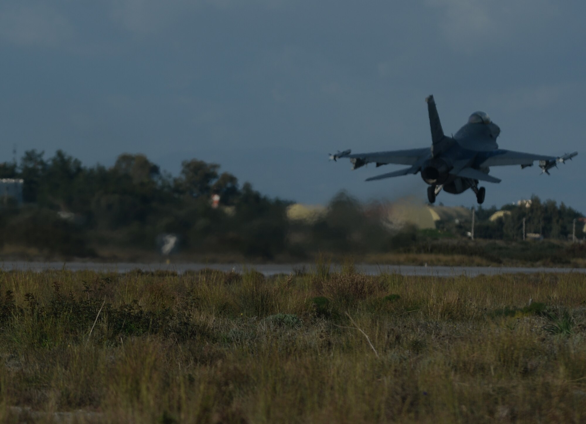 A U.S. Air Force F-16 Fighting Falcon fighter aircraft assigned to the 480th Expeditionary Fighter Squadron takes off from the flightline during a flying training deployment at Souda Bay, Greece, Jan. 28, 2015. Eighteen F-16s from the 52nd FIghter Wing at Spangdahlem Air Base, Germany, participated in the deployment, which marked the third of its kind on the island since 2014. (U.S. Air Force photo by Staff Sgt. Joe W. McFadden/Released)