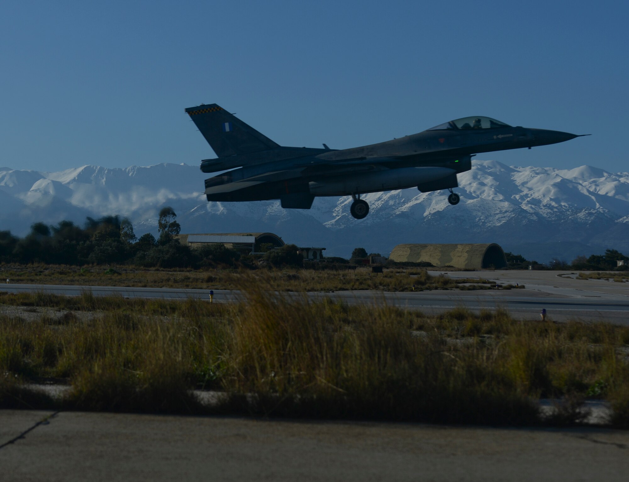 A Hellenic air force F-16 Fighting Falcon fighter aircraft assigned to the 340th Fighter Squadron takes off from the flightline during a flying training deployment at Souda Bay, Greece, Jan. 28, 2015. The aircraft conducted the training as part of the bilateral deployment between the Greek and U.S. Air Forces to develop interoperability and cohesion between the two NATO partners. (U.S. Air Force photo by Staff Sgt. Joe W. McFadden/Released)