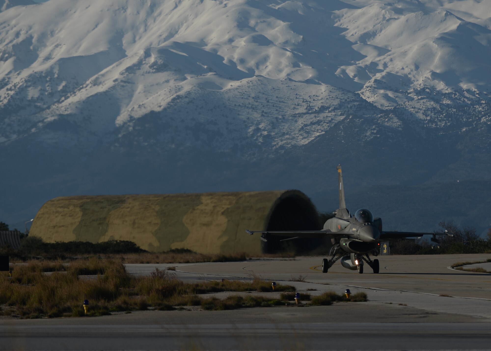 A Hellenic air force F-16 Fighting Falcon fighter aircraft assigned to the 340th Fighter Squadron taxis during a flying training deployment on the flightline at Souda Bay, Greece, Jan. 28, 2015. The training covered basic and air combat maneuvers aimed at honing the skills between the Greek and U.S. Air Forces. (U.S. Air Force photo by Staff Sgt. Joe W. McFadden/Released)