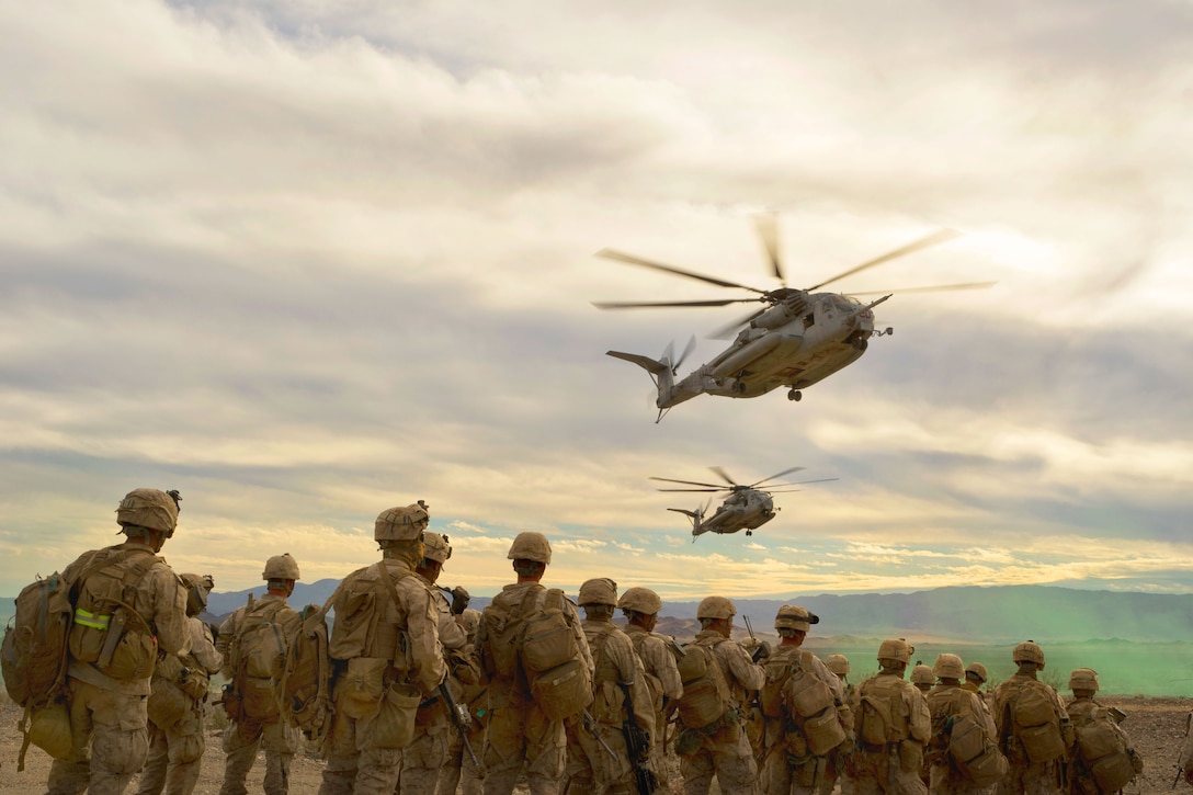 Marine Corps CH-53E Super Stallion helicopters prepare to land during Integrated Training Exercise 2-15 at the Marine Corps Air Ground Combat Center in Twentynine Palms, Calif., Jan. 25, 2015.