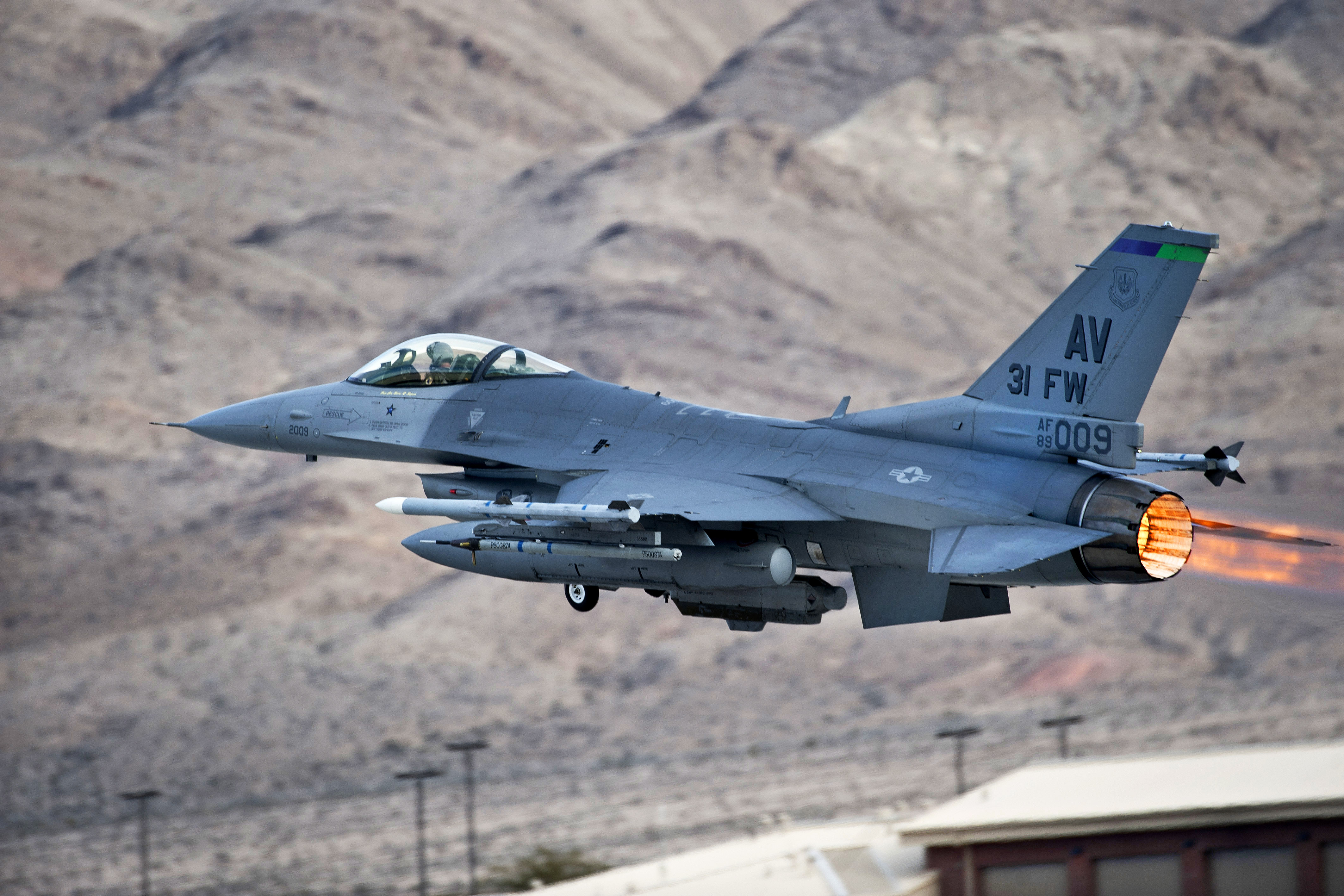 A U.S. Air Force F-16 Fighting Falcon aircraft launches during Red Flag ...