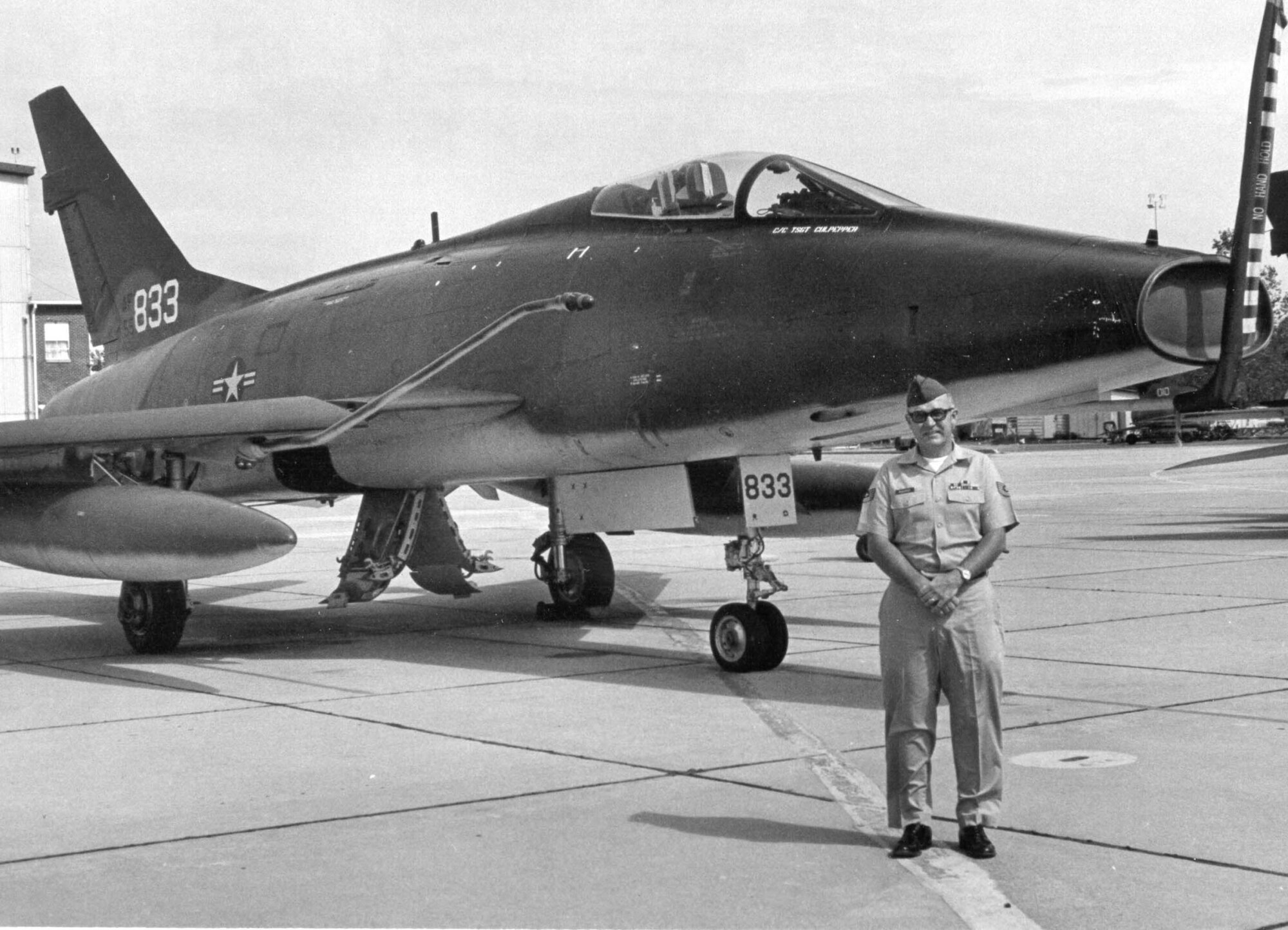 Tech. Sgt. Karl Mounger poses in front of an F-100 at Ebbing Air National Guard Base, Fort Smith, Ark., in 1975. Mounger was chosen as Outstanding Non-Commissioned Officer of the Year that year. (Courtesy photo)