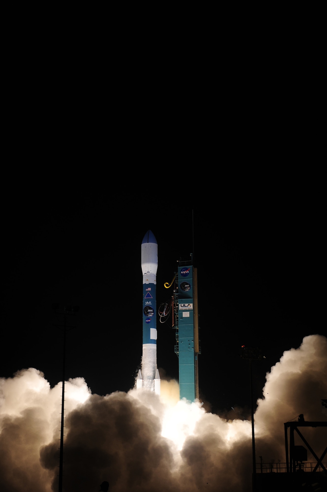 A United Launch Alliance Delta II rocket successfully launches from Vandenberg Air Force Base Space Launch Complex-2, Jan. 31, 2015 at 6:22 a.m. PDT. This Delta II rocket carried NASA's Soil Moisture Active Passive; the first Earth observing satellite. SMAP is designed to collect global observations of surface soil moisture and its freeze/thaw state. High resolution space-based measurements of soil moisture and whether the soil is frozen or thawed will give scientists a new capability to observe and predict natural hazards of extreme weather, climate change, floods and droughts, and will help reduce uncertainties in the understanding of Earth's water and carbon cycles. (U.S. Air Force photo by Joe Davila/Released)