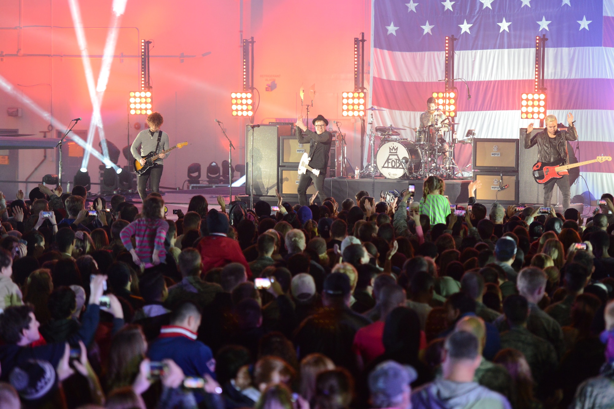 Fall Out Boy performs on stage at Hangar 999 at Luke Air Force Base, Arizona, Jan. 30, 2015. Thousands of Thunderbolts turned out for this event which featured Charli XCX and Fall Out Boy. (U.S. Air Force photo by Senior Airman James Hensley)