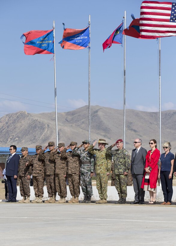 Distinguished visitors await the arrival of the Mongolian president, Tsakhiagiin Elbegdorj, during the Khaan Quest 2015 closing ceremony held in Tavantolgoi, Mongolia, July 1, 2015. Khaan Quest is a regularly scheduled, multinational exercise hosted annually by Mongolian Armed Forces and co-sponsored by U.S. Army Pacific, and U.S. Marine Corps Forces, Pacific. This year marks the 13th iteration of Khaan Quest.