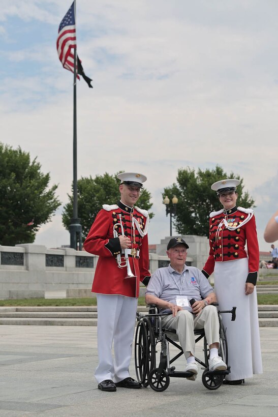 Members of "The President's Own" U.S. Marine Band supported a ceremony for World War II veterans with Honor Flight Chicago on June 30, 2015, at the National World War II Memorial. (USMC photo by Staff Sgt. Brian Rust/released)
