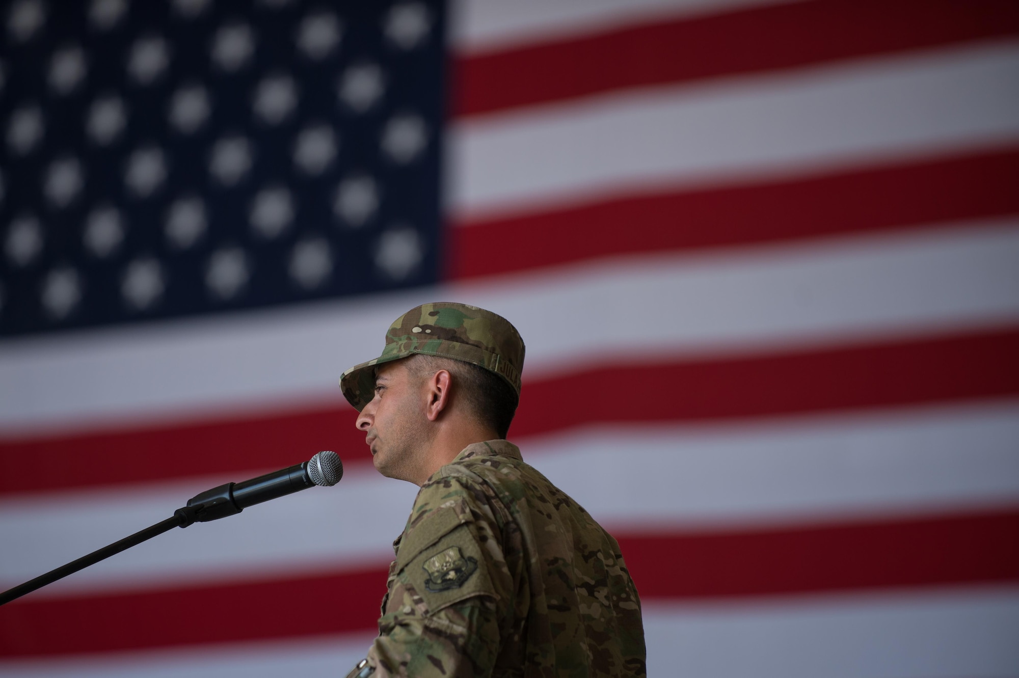 U.S. Air Force Brig. Gen. Dave Julazadeh, 455th Air Expeditionary Wing commander, speaks during the 455th AEW change of command ceremony July 1, 2015, at Bagram Airfield, Afghanistan. During the ceremony Julazadeh took over command of the 455th AEW from Brig. Gen. Mark Kelly.  (U.S. Air Force photo by Tech. Sgt. Joseph Swafford/Released)