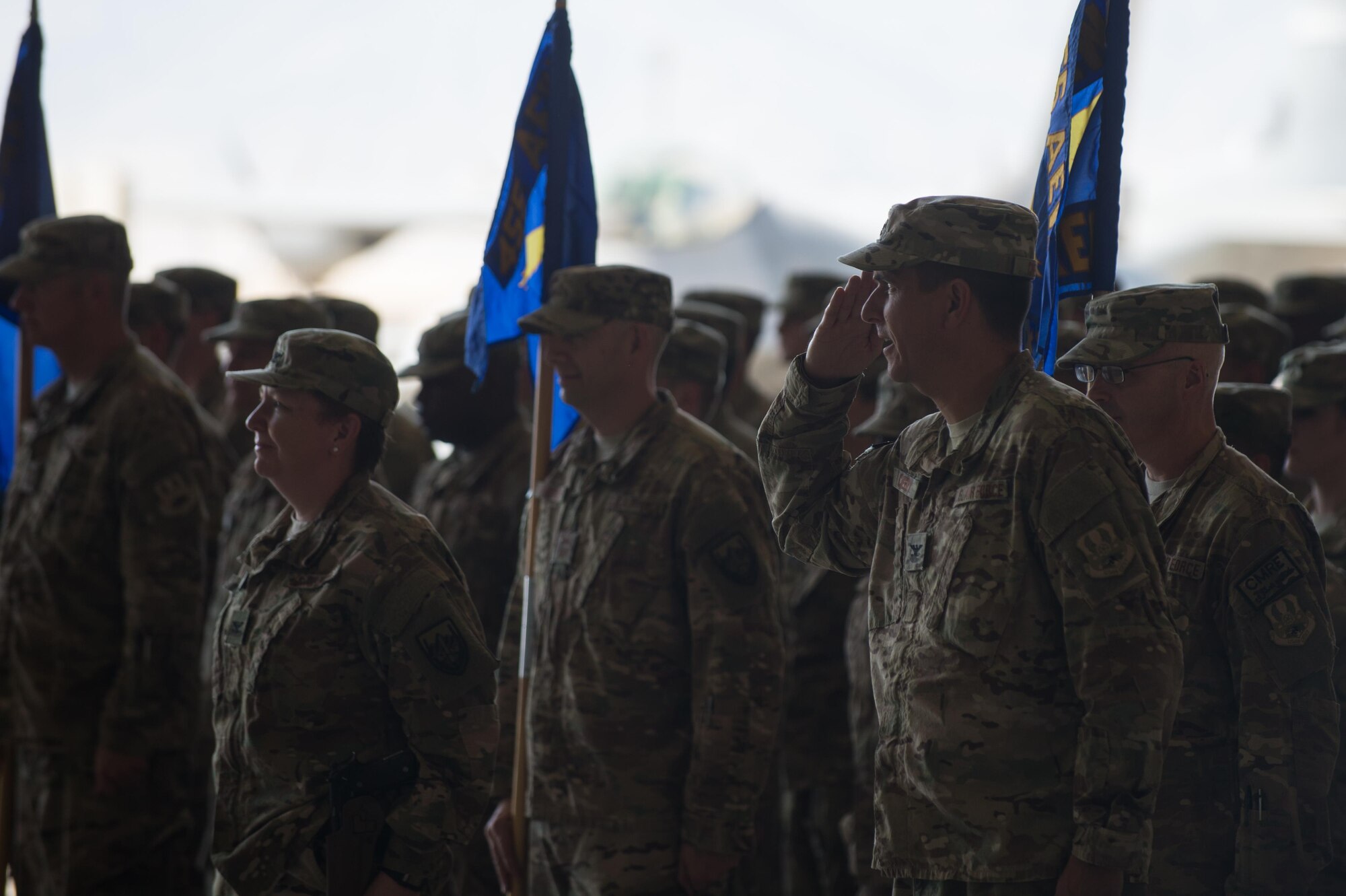 U.S. Air Force Col. Rhude Cherry, 451st Air Expeditionary Group commander, salutes during the 455th Air Expeditionary Wing change of command ceremony at Bagram Airfield, Afghanistan, July 1, 2015. During the ceremony Kelly relinquished command of the 455th AEW to Brig. Gen. Dave Julazadeh.  (U.S. Air Force photo by Tech. Sgt. Joseph Swafford/Released)