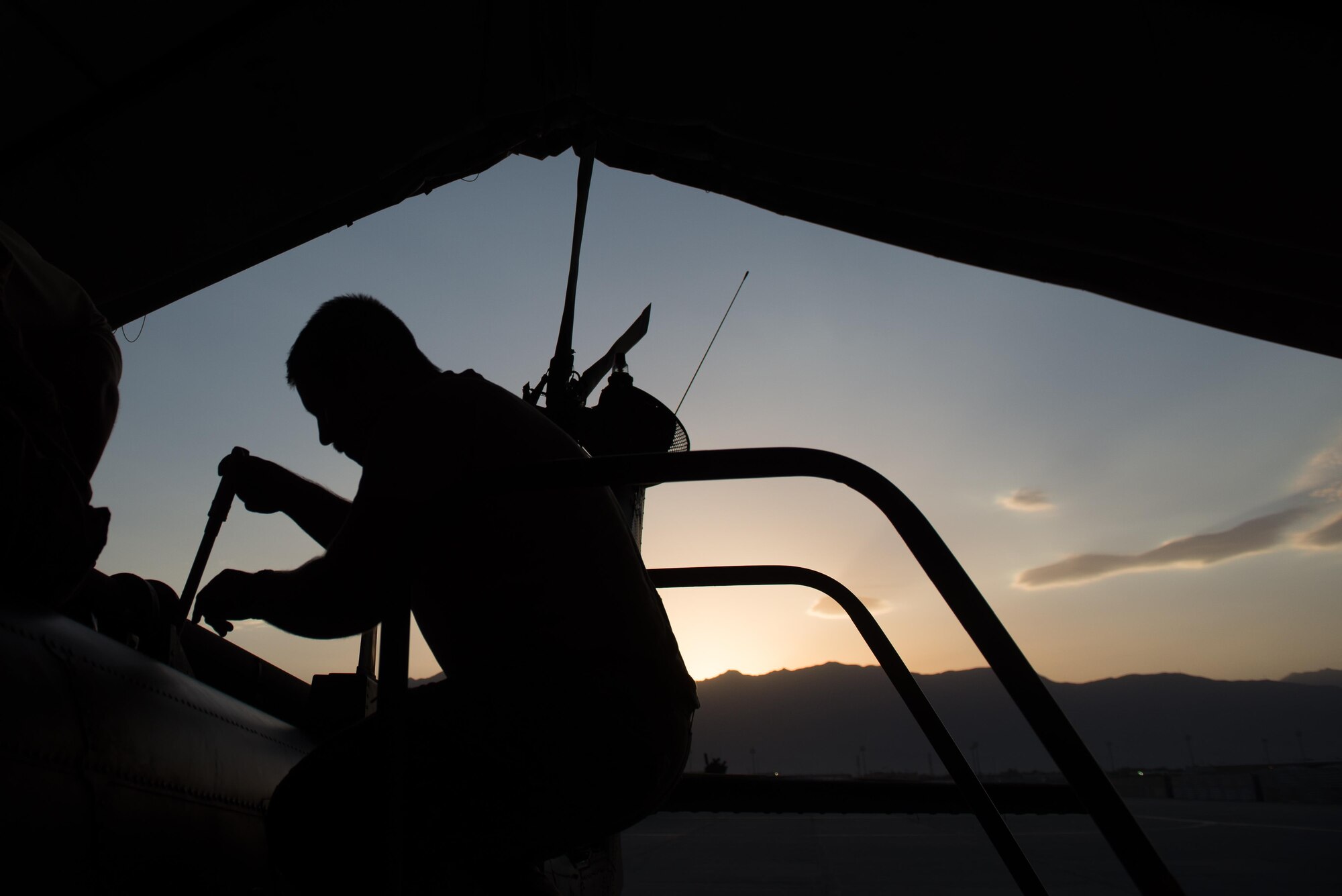 U.S. Air Force Senior Airman Joseph Roberts, 41st Expeditionary Helicopter Maintenance Unit crew chief, works to complete a 50 hour inspection on a HH-60 Pave Hawk helicopter at Bagram Airfield, Afghanistan, June 28, 2015. The 41st EHMU ensure Pave Hawks on Bagram are prepared for flight and return them to a mission-ready state once they land.  (U.S. Air Force photo by Tech. Sgt. Joseph Swafford/Released)