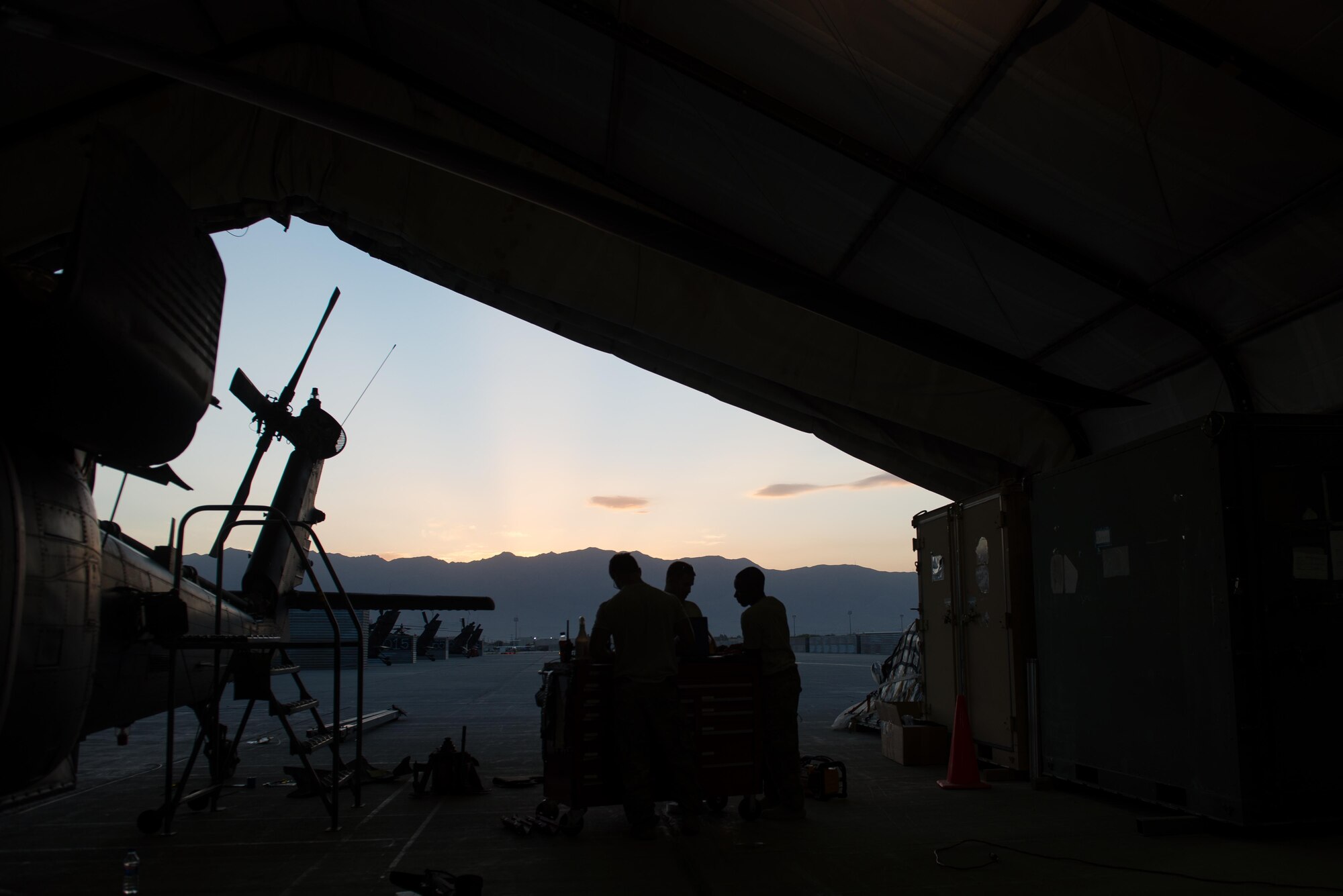 U.S. Airmen assigned to the 41st Expeditionary Helicopter Maintenance Unit work to complete a 50 hour inspection on a HH-60 Pave Hawk helicopter at Bagram Airfield, Afghanistan, June 28, 2015. The 41st EHMU ensure Pave Hawks on Bagram are prepared for flight and return them to a mission-ready state once they land.  (U.S. Air Force photo by Tech. Sgt. Joseph Swafford/Released)
