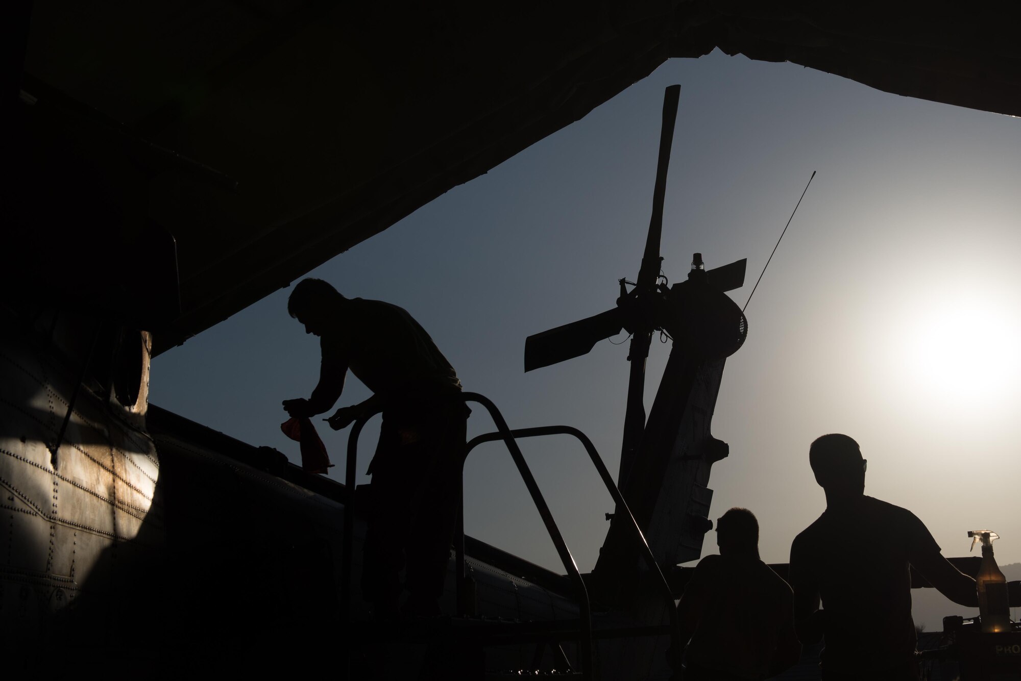 U.S. Airmen assigned to the 41st Expeditionary Helicopter Maintenance Unit work to complete a 50 hour inspection on a HH-60 Pave Hawk helicopter at Bagram Airfield, Afghanistan, June 28, 2015. The 41st EHMU ensure Pave Hawks on Bagram are prepared for flight and return them to a mission-ready state once they land.  (U.S. Air Force photo by Tech. Sgt. Joseph Swafford/Released)