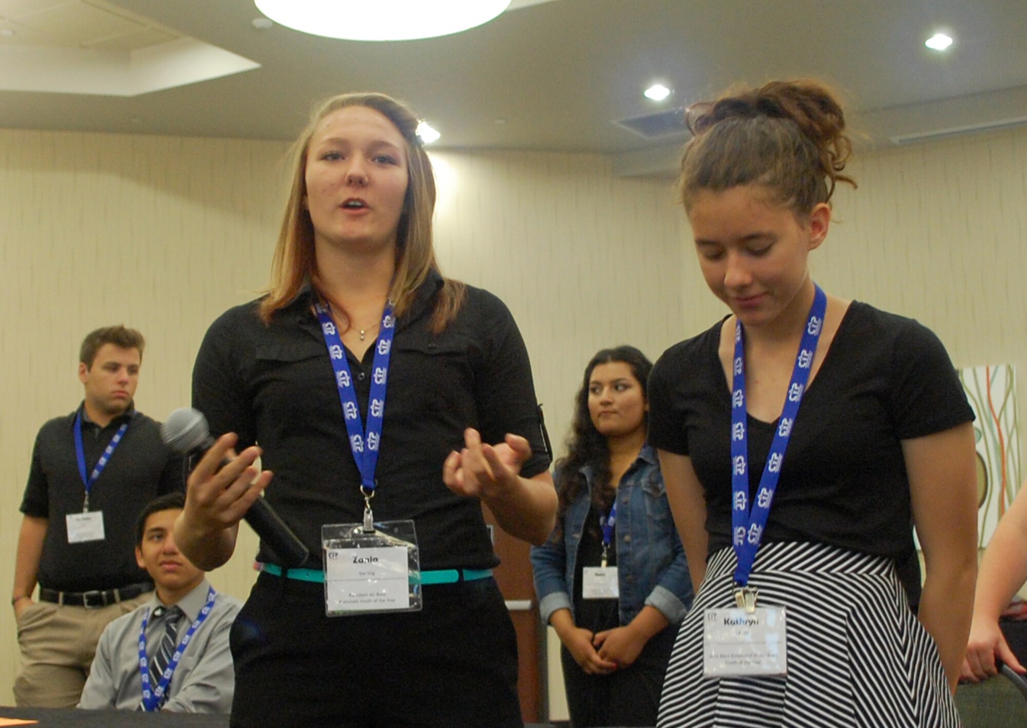 At left, Zania Sterling, installation-level winner for Ramstein Air Base, Germany, for the Air Force Youth of the Year competition, explains her group's answer puzzle question during a leadership discussion, June 24. Installation-level winners from 51 Air Force bases around the world gathered in San Antonio June 22-26, 2015, for the Youth of the Year Youth Leadership Camp, run through a partnership between Air Force Youth Programs and the Boys & Girls Club of America. The week-long event included leadership development and team-building exercises and offered participants the chance to connect with like-minded peers. (U.S. Air Force photo/Master Sgt. Christian Michael/RELEASED)