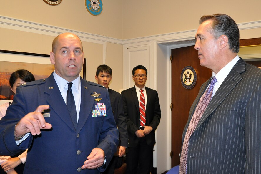 910th Airlift Wing Commander Col. James Dignan, based at Youngstown Air Reserve Station (YARS), Ohio, talks with Congressman Trent Franks, Arizona 8th district, on Capitol Hill here, June 25, 2015. Dignan visited the congressman’s office to discuss the 910th’s one-of-a-kind large area, fixed wing aerial spray capability as part of the commander’s Air Force Reserve Capitol Hill Visit program, June 24 and 25, 2015. 910th Citizen Airmen flying the unit’s C-130H Hercules aircraft provide growth control of invasive weeds at Luke Air Force Base’s Barry Goldwater bombing range, located in the congressman’s district, by treating the target areas with aerially sprayed herbicide. The primary purpose of the Capitol Hill Visit program is to assist Air Force Reserve commanders in improving and building on relationships established with congressional delegations and to increase their unit’s visibility with members of congress. U.S. Air Force photo by Master Sgt. Bob Barko Jr.