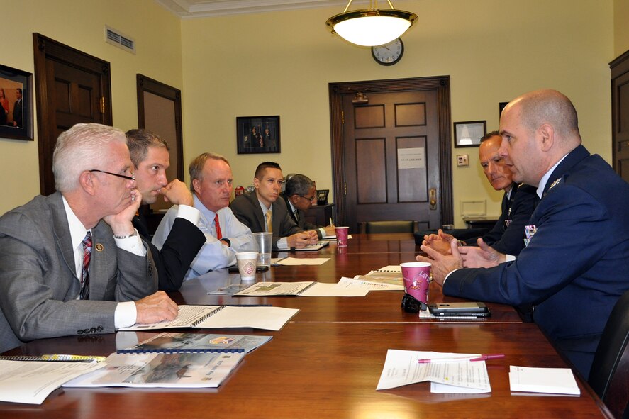 910th Airlift Wing Commander Col. James Dignan (far right), based at Youngstown Air Reserve Station (YARS), Ohio, talks with Congressman Bill Johnson, Ohio 6th district (far left); Congressman Tim Ryan, Ohio 13th district (second from left) and Congressman David Joyce, Ohio 14th district (third from left), during a meeting on Capitol Hill here, June 25, 2015. Also listening to the 910th commander is Mr. Ryan Keating, Congressman Ryan’s Deputy Chief of Staff (fourth from left); Mr. Felix Castro, Congressman Ryan’s Defense Legislative Fellow (fifth from left), and 910th Airlift Wing Vice Commander Col. Darryl Markowski (second from right). Dignan visited with the congressmen and their staffers to discuss the 910th’s mission as well as several issues concerning the unit and installation as part of the commander’s Air Force Reserve Capitol Hill Visit program, June 24 and 25, 2015. The primary purpose of the program is to assist commanders in improving and building on relationships established with congressional delegations and to increase their unit’s visibility with members of congress. U.S. Air Force photo/Master Sgt. Bob Barko Jr.